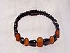 Single Strand Irridescent Bracelet with orange beads